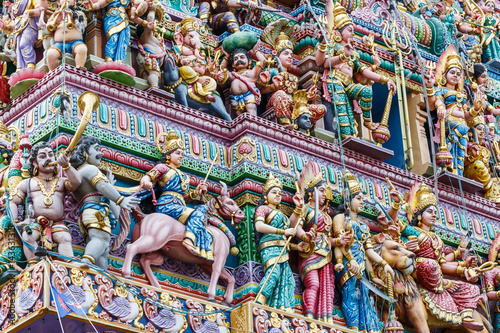 Intricate Hindu art and deity carvings on the facade of Sri Veeramakaliamman Temple in Little India, Singapore.