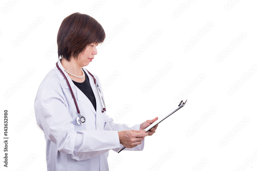 Asian female medical doctor with stethoscope reading report Asian female medical doctor with stethoscope reading report