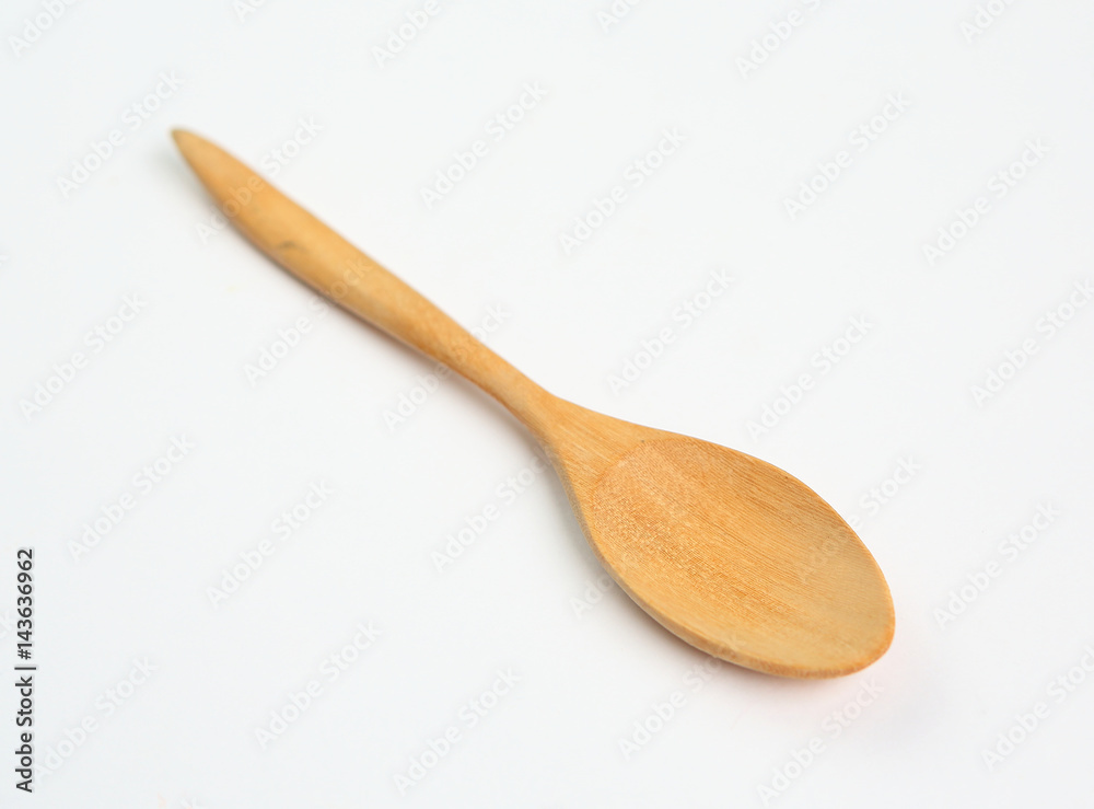 wooden spoon isolated over white wooden spoon isolated over white
