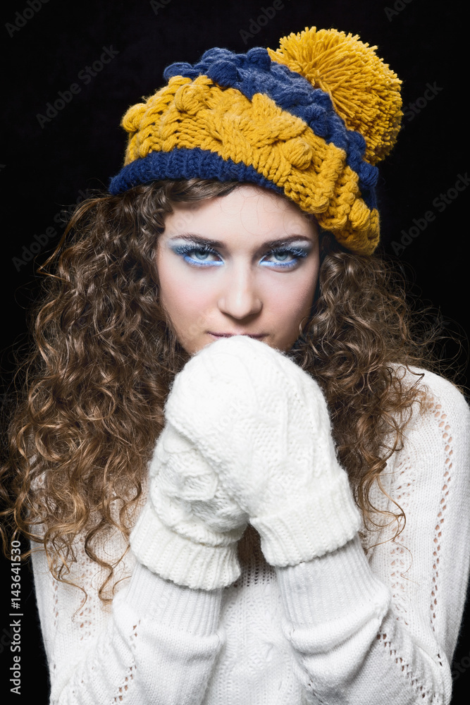 Young beautiful woman in knitted funny hat Young beautiful woman in knitted funny hat