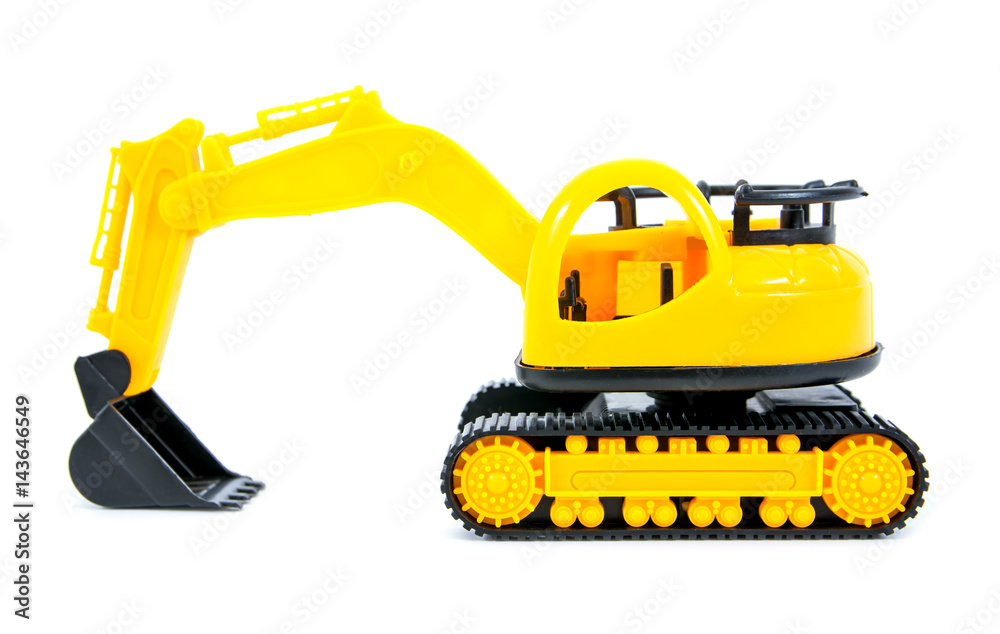 Fototapeta premium Bulldozer toy isolated on white background.Yellow bulldozer toy isolated.Modern bulldozer toy