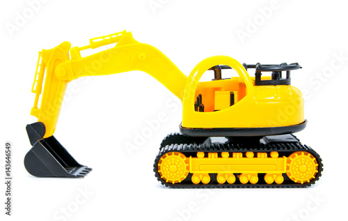 Bulldozer toy isolated on white background.Yellow bulldozer toy isolated.Modern bulldozer toy