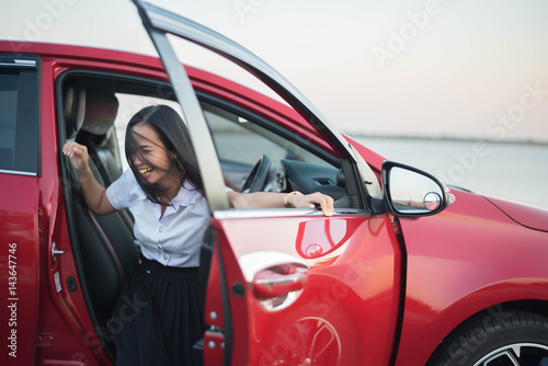 young woman happy and car in the park © stcom