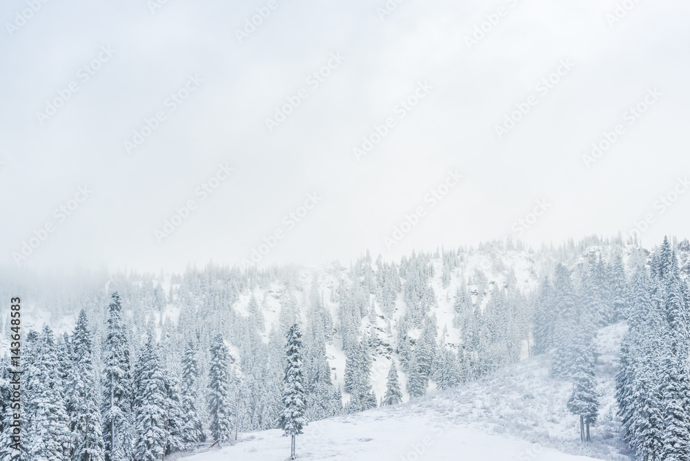 scenic view of small people walking in snow mountain. scenic view of small people walking in snow mountain.
