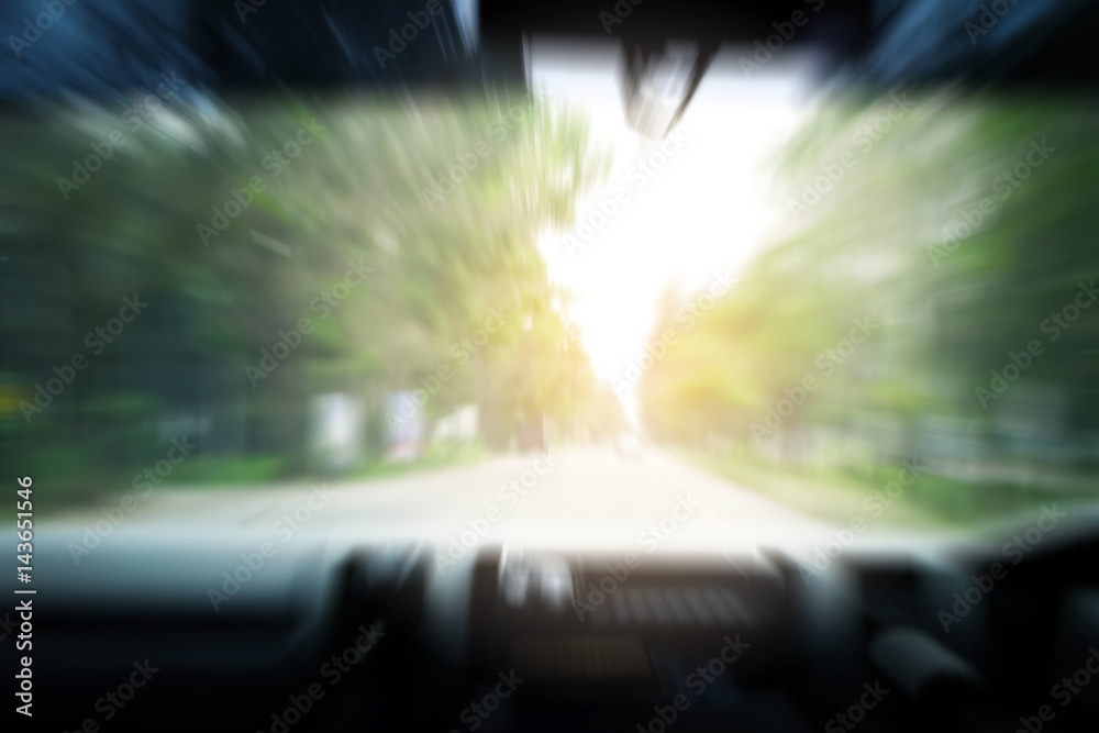 Abstract blur of a car running on the road at high speed or intoxication from alcohol