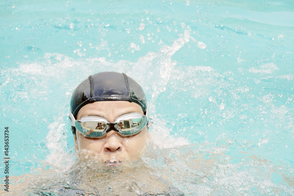 women exercise by swimming to stay healthy.