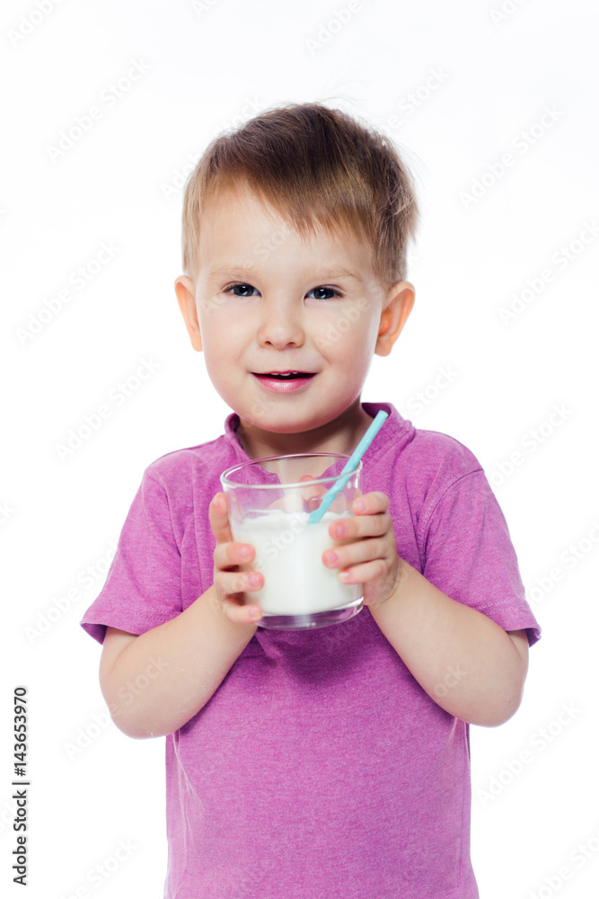 Portrait of a cute little boy enjoying a glass of milk Portrait of a cute little boy enjoying a glass of milk