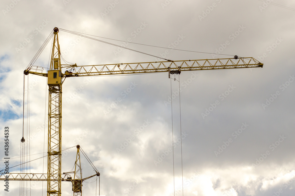 crane construction site blue sky background