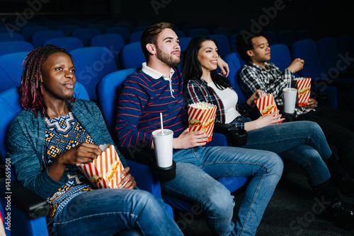 Watching a movie at the theatre photo