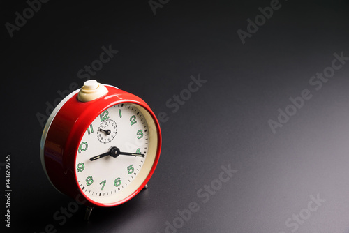Red alarm clock isolated on black background, Time concept, Rush hour concept, Copy space image for your text.