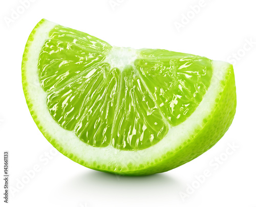 Ripe wedge of green lime citrus fruit isolated on white background. Lime slice with clipping path