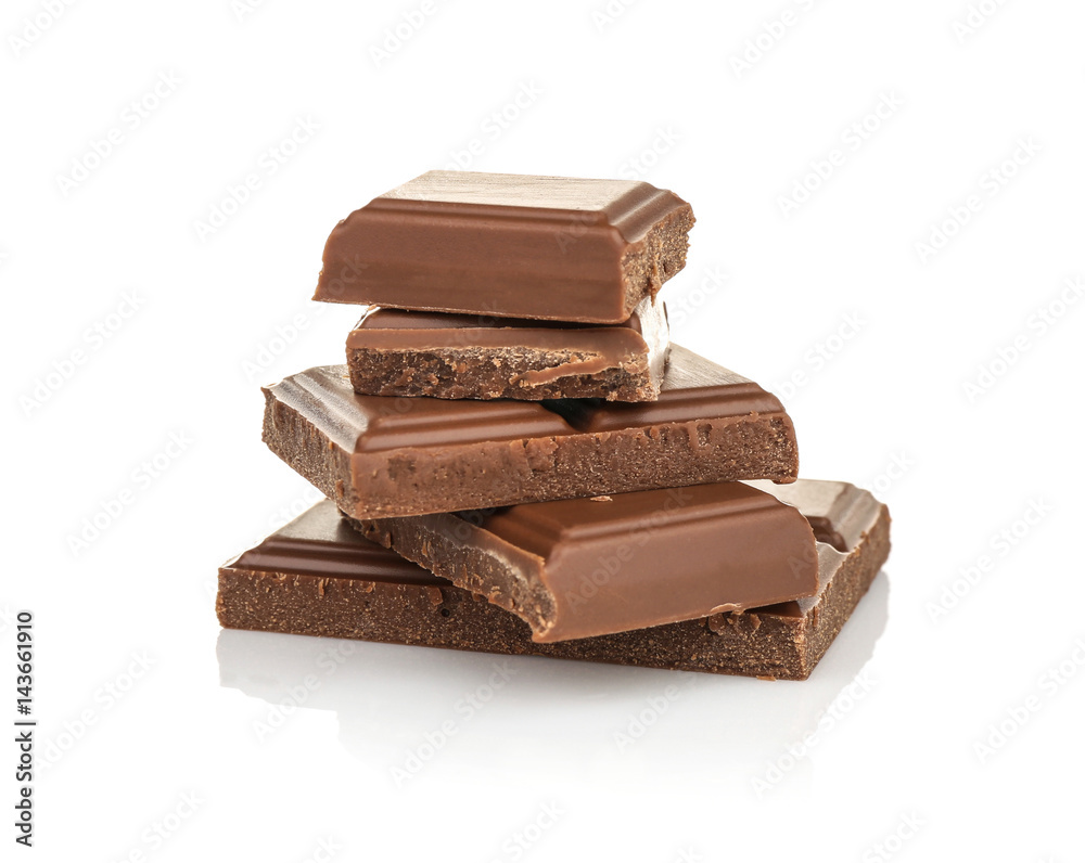 Broken chocolate pieces on white background Broken chocolate pieces on white background