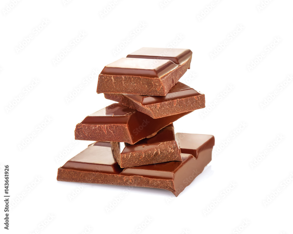 Broken chocolate pieces on white background Broken chocolate pieces on white background