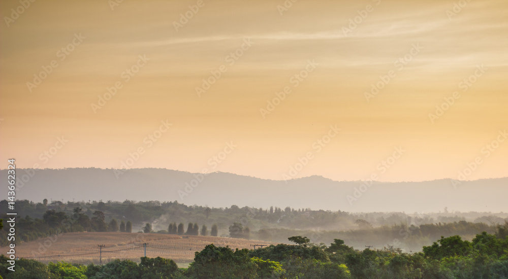 Fototapeta premium Sunny morning in the fog and mountain view