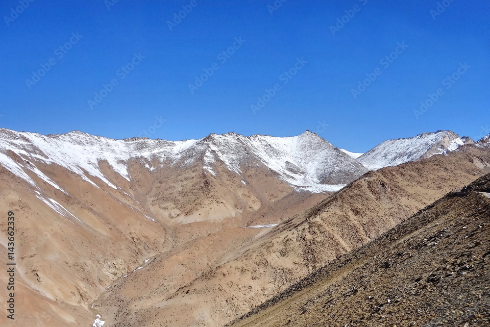 view of snow peaks, Leh ladakh landscape, blue sky , Jammu and Kashmir, India