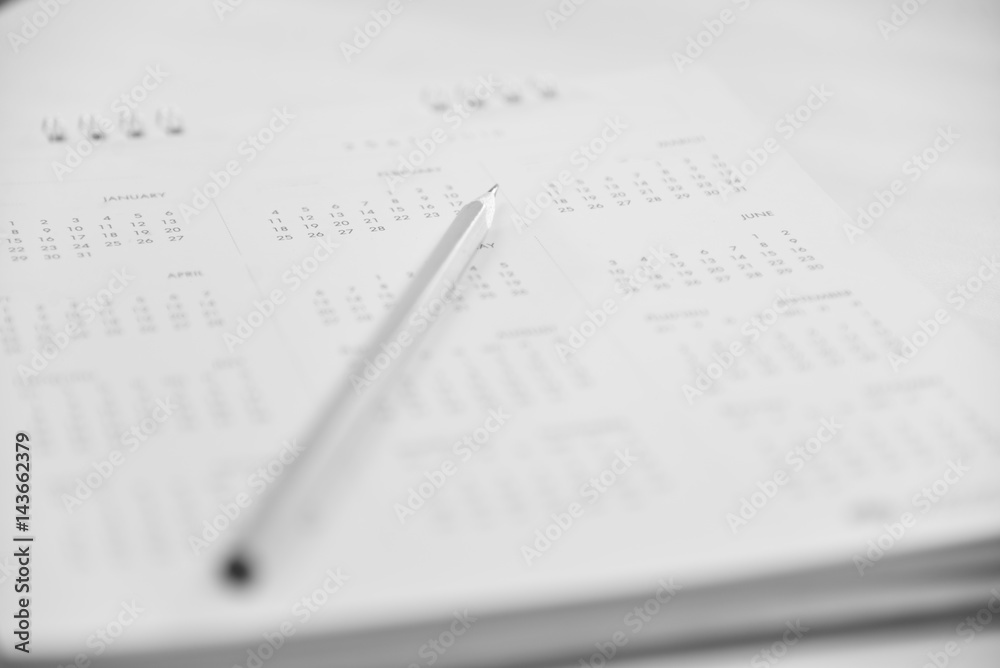 Fototapeta premium Blurred calendar page in planning concept black and white tone.