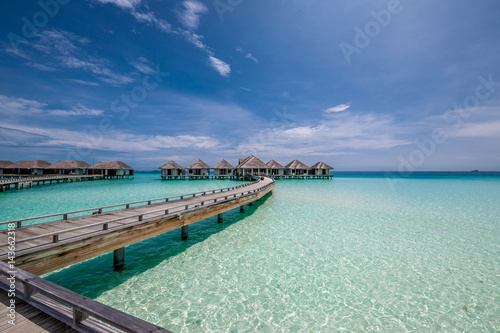 Wallpaper Mural Beautiful beach with water bungalows Torontodigital.ca