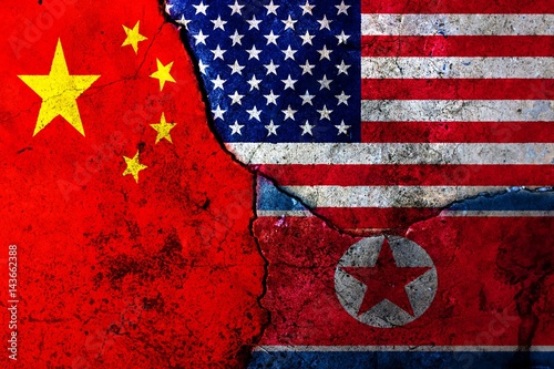 Cracks in the wall. Flags: USA, China, North Korea