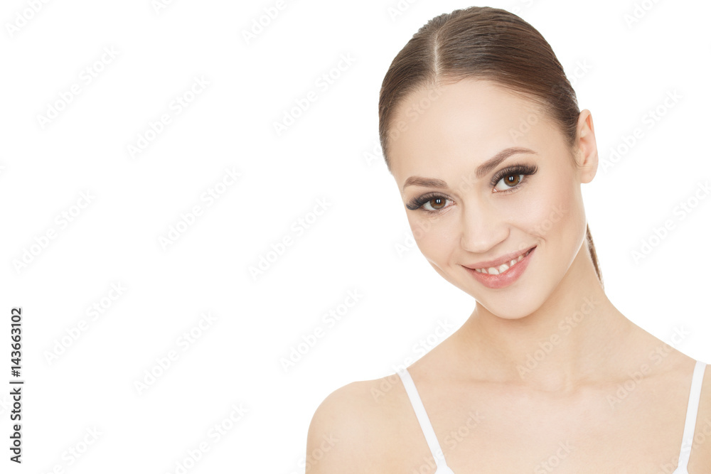 Face of wellbeing. Portrait of a gorgeous female model smiling looking to the camera on white background copyspace on the side. Face of wellbeing. Portrait of a gorgeous female model smiling looking to the camera on white background copyspace on the side.