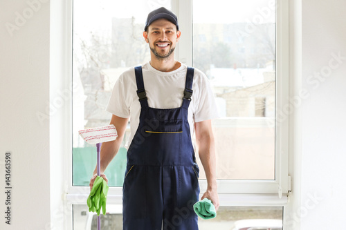 Handsome young window clean...