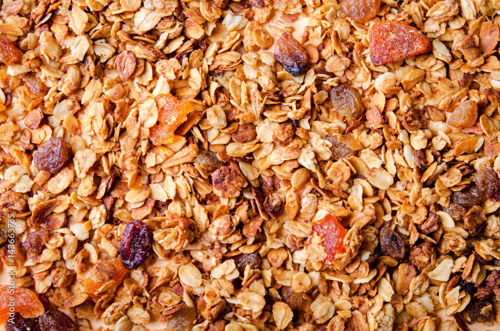 Homemade granola with honey, oatmeal, nuts, raisin, cranberry and dried apricots Homemade granola with honey, oatmeal, nuts, raisin, cranberry and dried apricots
