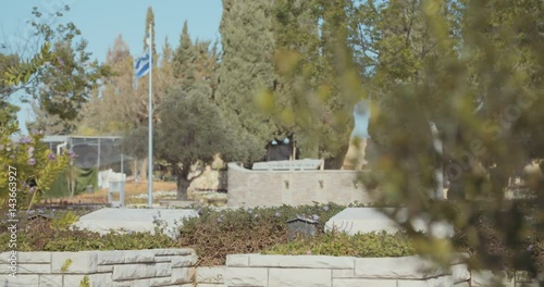 Tracking shot of graves at a military cemetery  photo