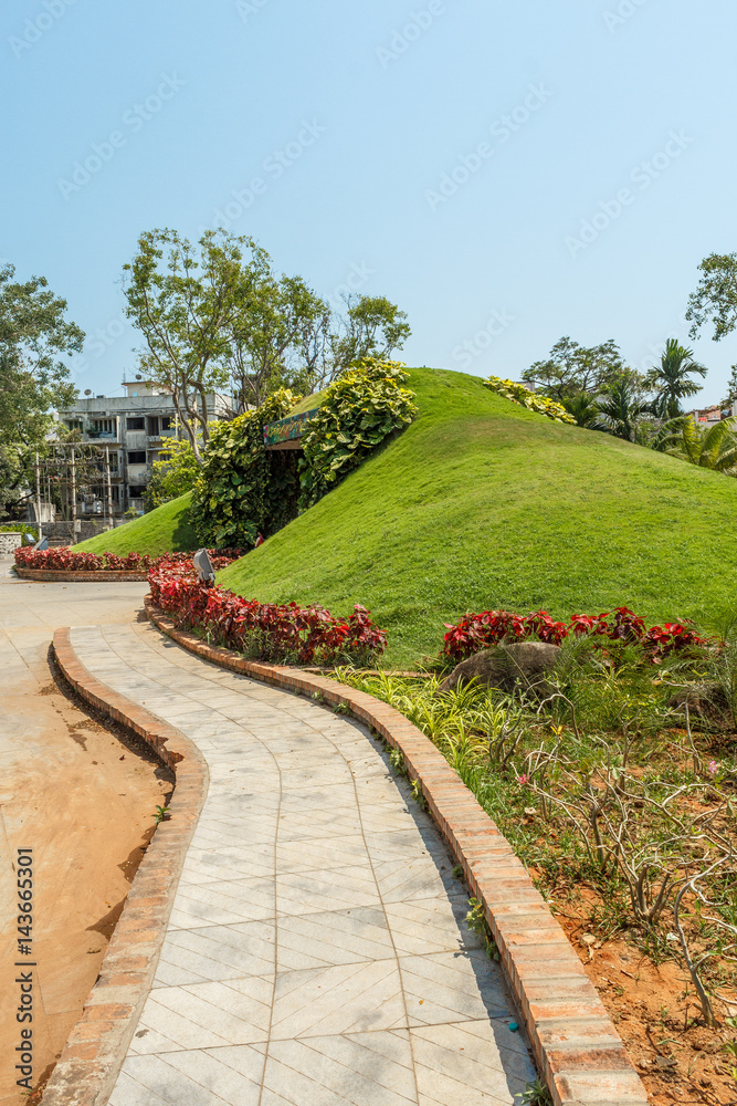 Narrow view of green garden and pathway, Chennai, India, April 01 2017