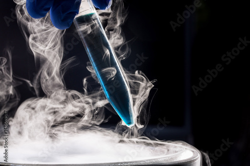 Experiment with a tube containing blue liquid in liquid nitrogen photo