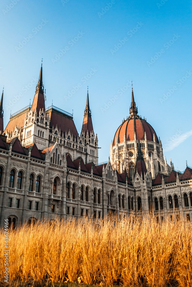 Parliament building in Budapest, with details on the facade and  monuments of the building