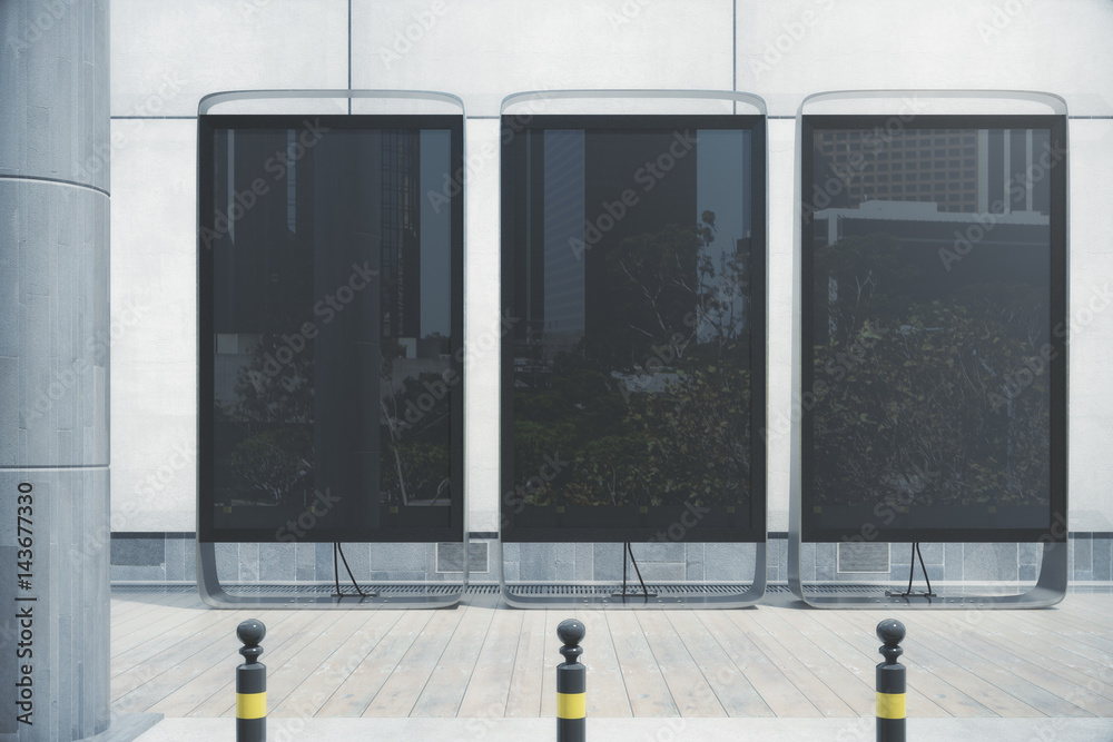 Obraz premium Three black banners outside