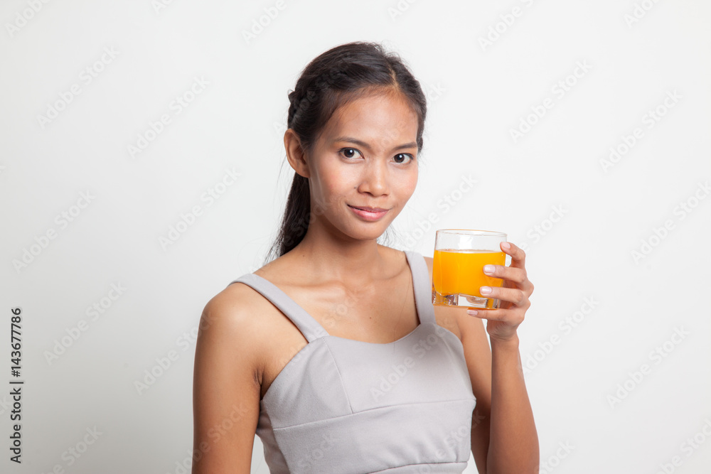 Young Asian woman drink orange juice. Young Asian woman drink orange juice.