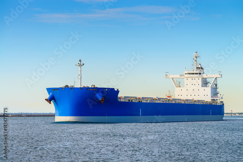 Cargo ship heading to open sea