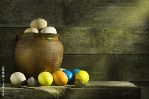 Rustic still life with Easter colorful eggs