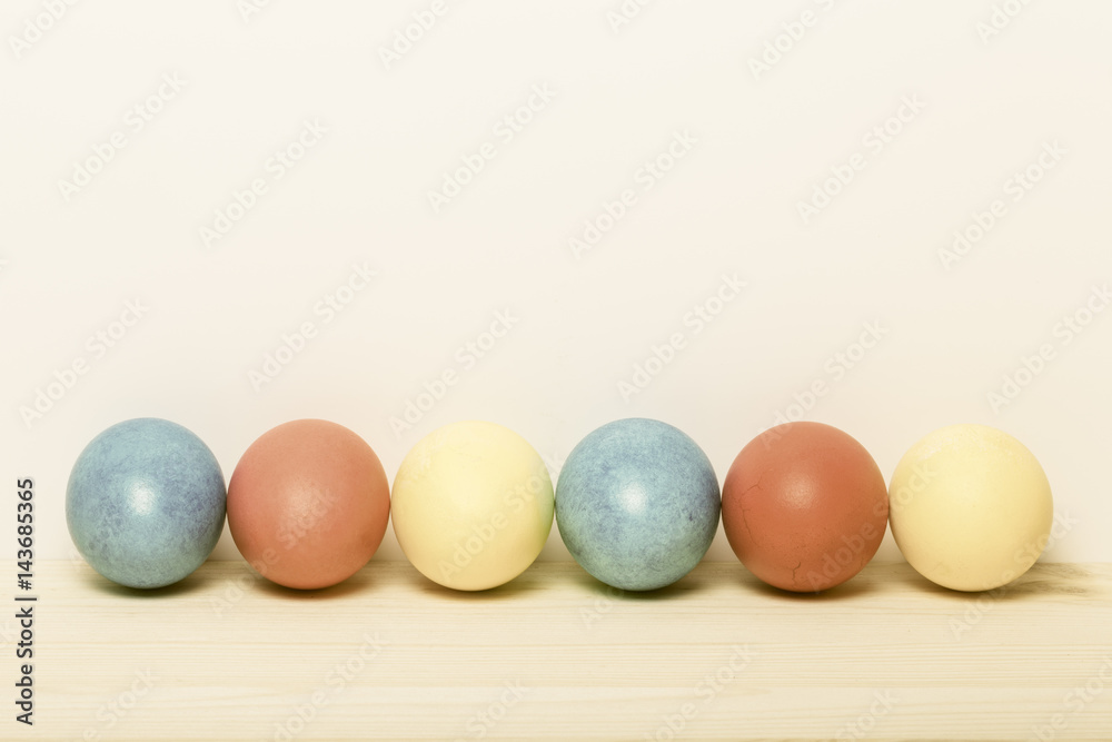 Easter composition on light wooden background. Toned Easter composition on light wooden background. Toned