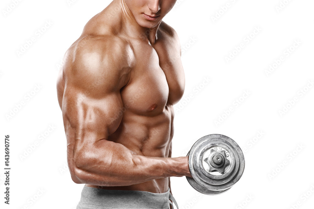 Muscular man working out doing exercises with dumbbells at biceps, strong male naked torso abs, isolated Muscular man working out doing exercises with dumbbells at biceps, strong male naked torso abs, isolated