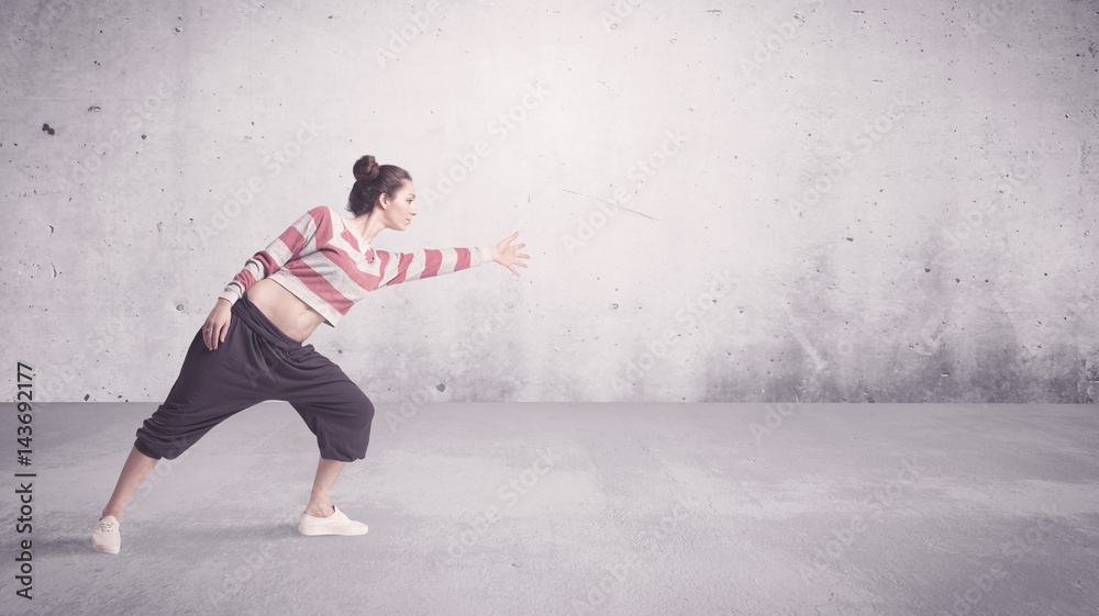 Pretty urban dancer with empty background Pretty urban dancer with empty background