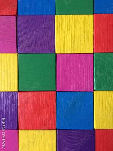 Colorful wooden cubes background. Top view.