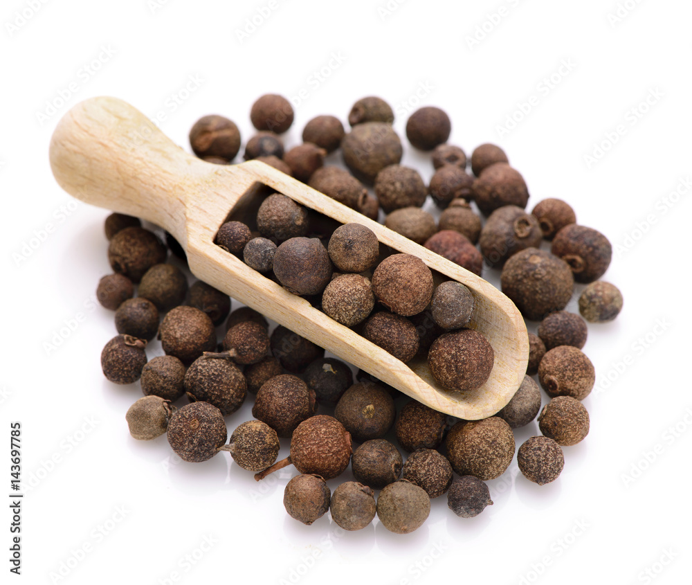 Whole allspice in a scoop Whole allspice in a scoop