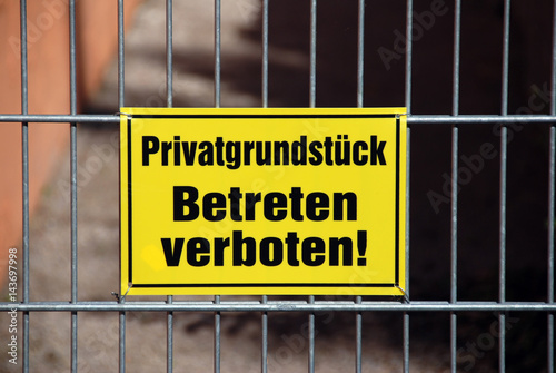 Yellow warning sign german Betreten verboten