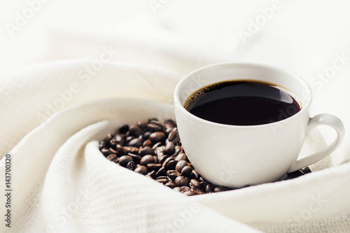 black coffee bean and white cup