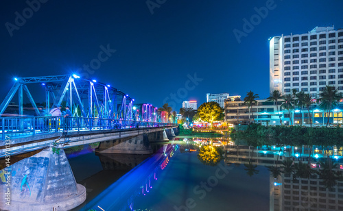 colorful light on Ping River at Iron bridge in Chiang mai, Thailand
