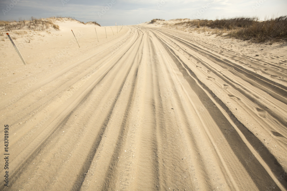 Off-road vehicle trail in the sand on Assateague Island, Maryland. Off-road vehicle trail in the sand on Assateague Island, Maryland.