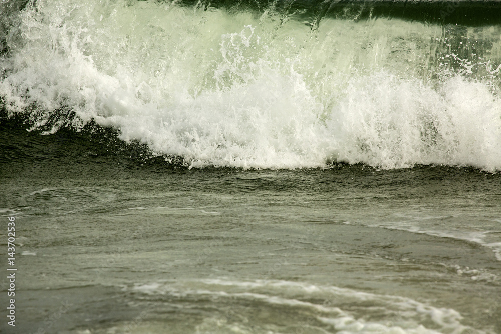 Closeup of big wave breaking on Assateague Island, Maryland.