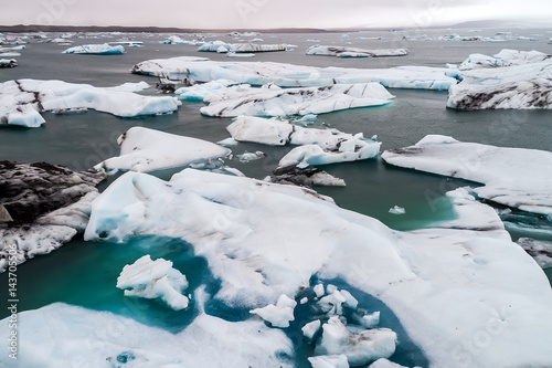 Aerial view of icebergs floating in Jokulsarlon Lagoon by the southern coast of Iceland