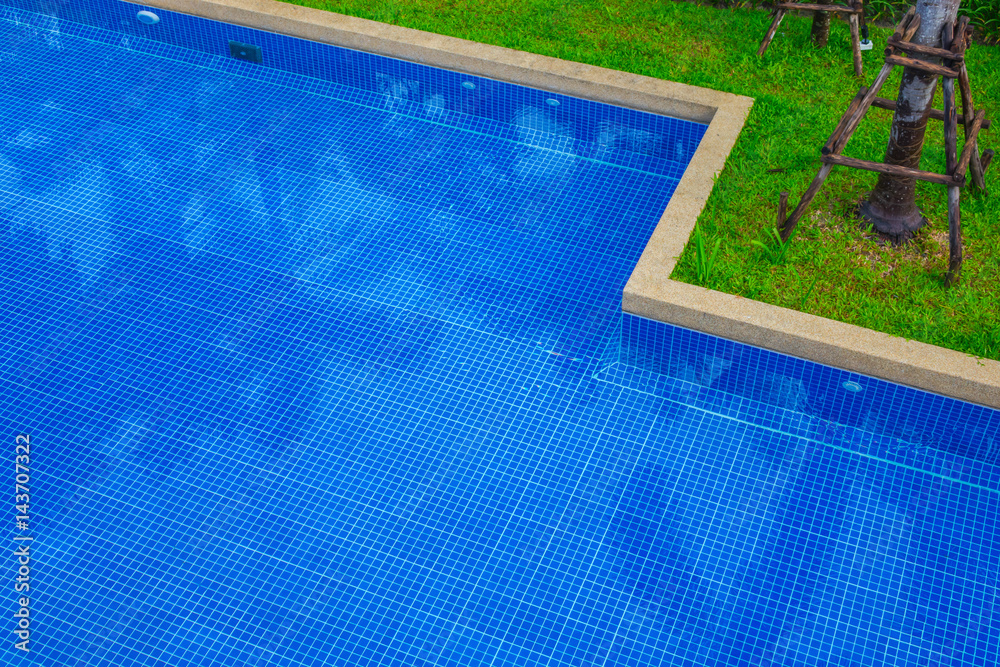 Beautiful Swimming pool in hotel pool resort .