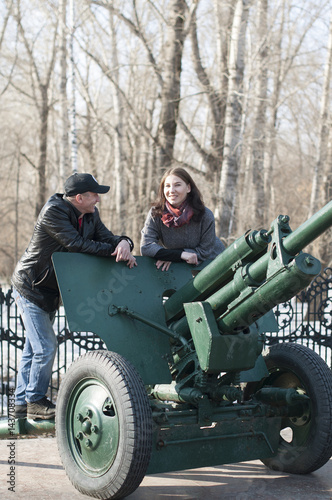 The loving couple walks in the park.
