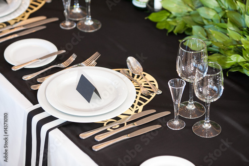 Wedding decor. Wedding interior, Festive black decor, table layout concept. expectation of guests.