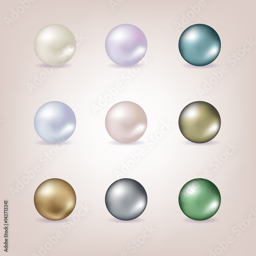 Set of different pearls isolated on pink background.