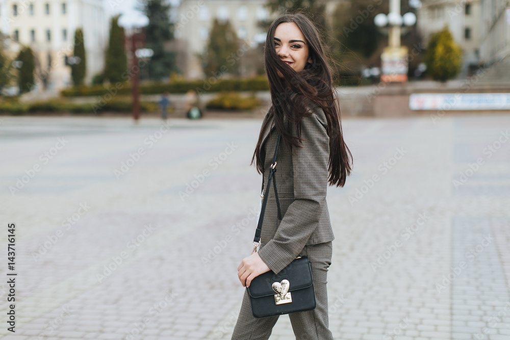 Fototapeta premium Portrait of business woman on the street.