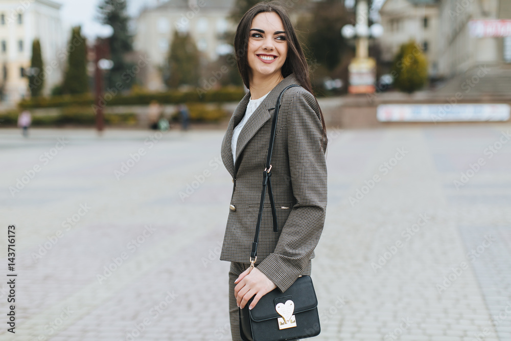 Fototapeta premium Portrait of business woman on the street.